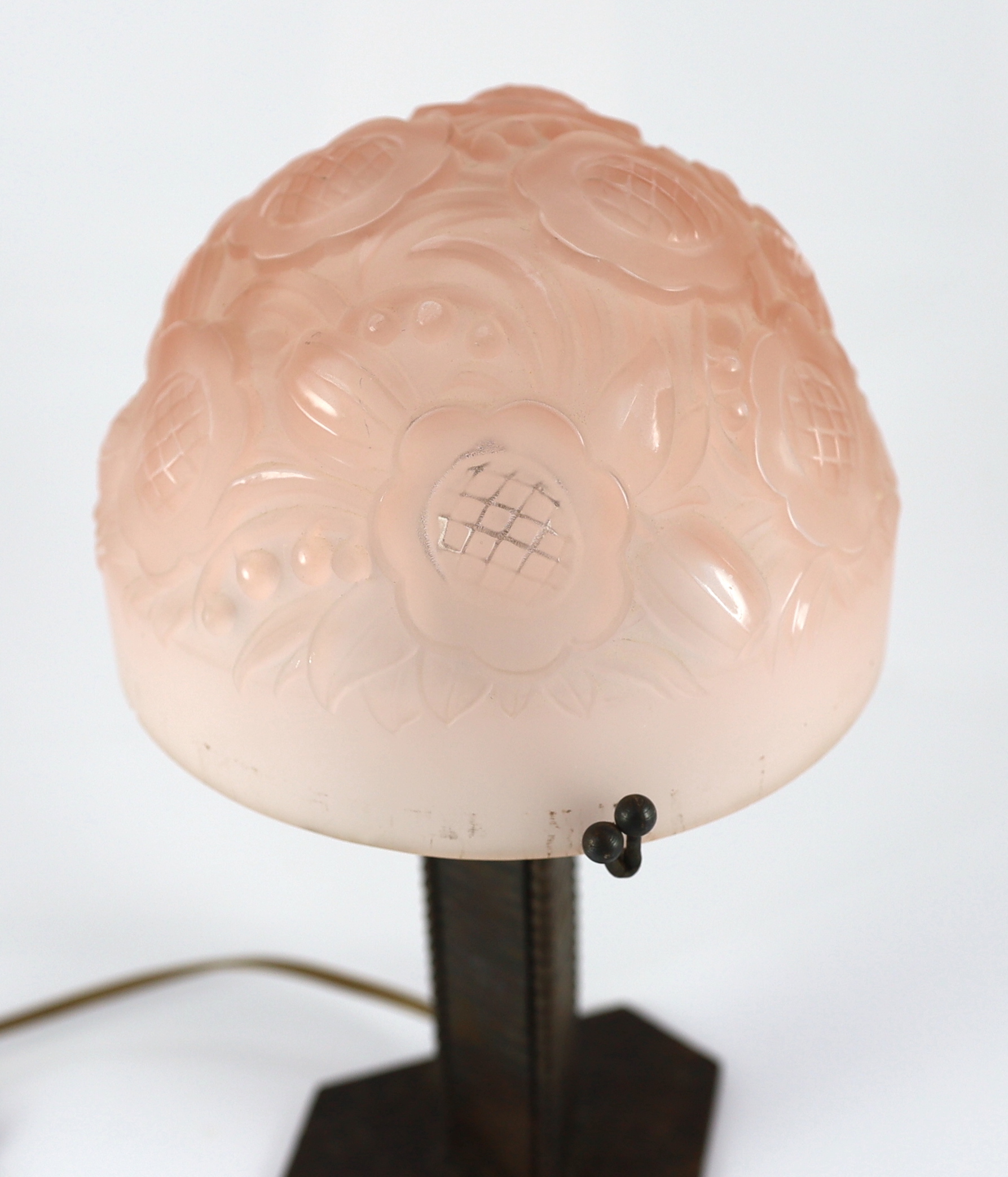 A Muller Freres Art Deco wrought iron and frosted pink glass table lamp, 28cm diameter, 30cm high